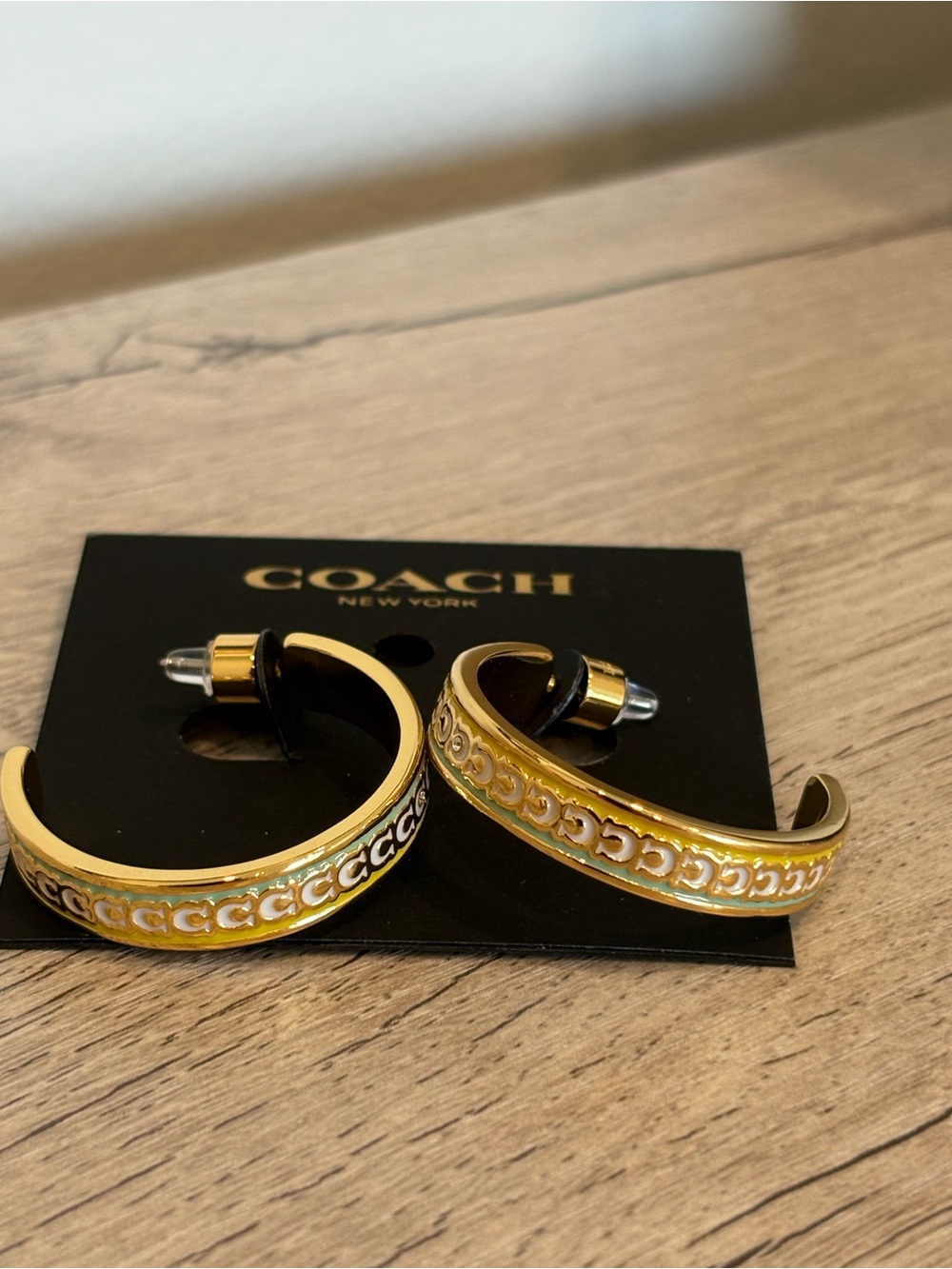 Coach Gold-Tone & Multicolored Half Hoop Earrings Surrounded with Coach Logo - Picture 3 of 4